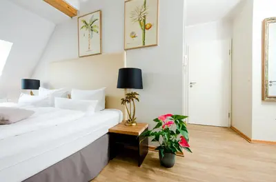 Ein Bett oder Betten in einem Zimmer der Unterkunft Design Apartments - 