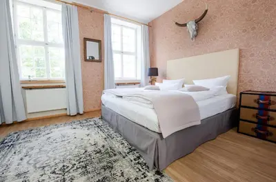 Ein Bett oder Betten in einem Zimmer der Unterkunft Design Apartments - 