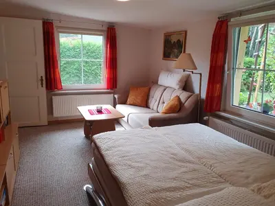 Ein Bett oder Betten in einem Zimmer der Unterkunft Ferienwohnung am Wald