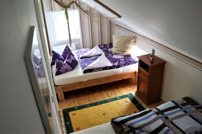 Ein Bett oder Betten in einem Zimmer der Unterkunft Altes Gärtnerhaus