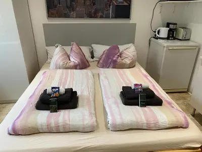 Ein Bett oder Betten in einem Zimmer der Unterkunft Zimmervermietung Berlin-Spandau