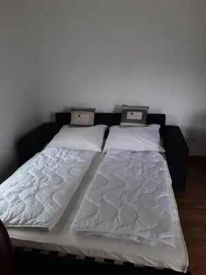 Ein Bett oder Betten in einem Zimmer der Unterkunft Zur alten Sommerküche
