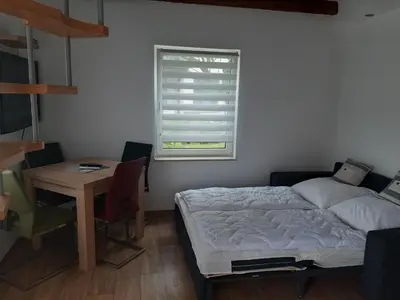 Ein Bett oder Betten in einem Zimmer der Unterkunft Zur alten Sommerküche