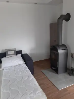 Ein Bett oder Betten in einem Zimmer der Unterkunft Zur alten Sommerküche