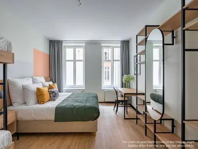 Ein Bett oder Betten in einem Zimmer der Unterkunft Numa Berlin Kater