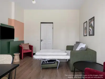 Ein Sitzbereich in der Unterkunft Numa Berlin Kater