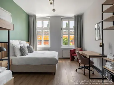 Ein Bett oder Betten in einem Zimmer der Unterkunft Numa Berlin Kater
