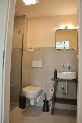 Ein Badezimmer in der Unterkunft Buntspecht Logis