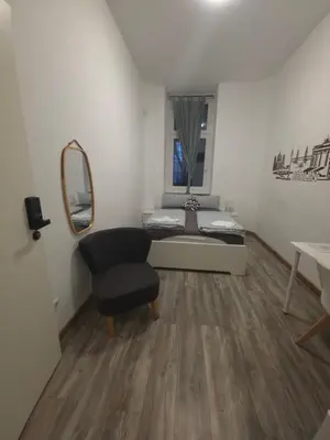Ein Bett oder Betten in einem Zimmer der Unterkunft Kiez Box TwentyForSeven private room