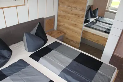 Ein Bett oder Betten in einem Zimmer der Unterkunft Spreewald Unterkünfte