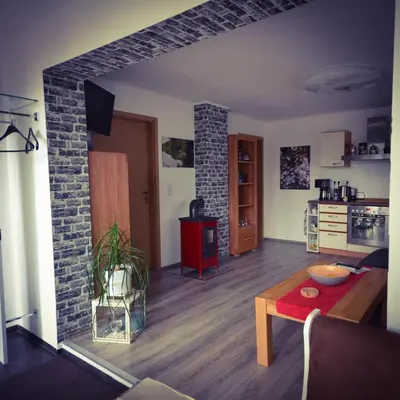 Ein Sitzbereich in der Unterkunft Ferienhaus am Birkenwaeldchen - Motzener See 150m