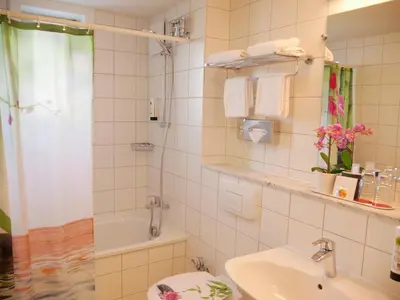 Ein Badezimmer in der Unterkunft Parkhotel Marzahn