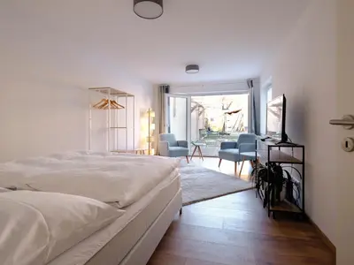 Ein Bett oder Betten in einem Zimmer der Unterkunft Travel Art Boardinghouse