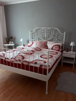 Ein Bett oder Betten in einem Zimmer der Unterkunft Ferienwohnung zum Schuster