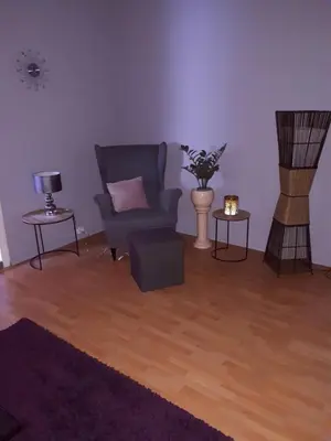 Ein Sitzbereich in der Unterkunft Ferienwohnung zum Schuster