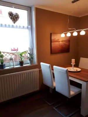 Ein Sitzbereich in der Unterkunft Ferienwohnung zum Schuster