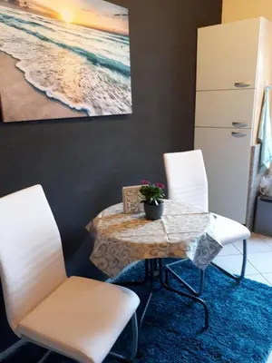 Ein Sitzbereich in der Unterkunft Ferienwohnung zum Schuster