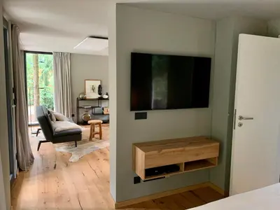 TV/Unterhaltungsangebot in der Unterkunft Bungalow im Wald