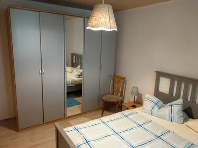 Ein Bett oder Betten in einem Zimmer der Unterkunft Storchennest an der Spree in Radinkendorf