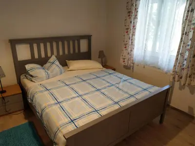 Ein Bett oder Betten in einem Zimmer der Unterkunft Storchennest an der Spree in Radinkendorf
