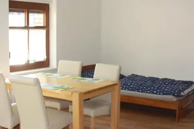 Ein Sitzbereich in der Unterkunft Ferienzimmer Tielesch