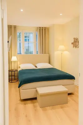 Ein Bett oder Betten in einem Zimmer der Unterkunft glorious cloud apartment
