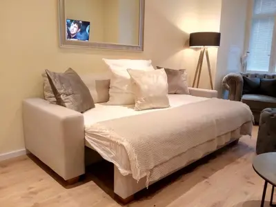 Ein Bett oder Betten in einem Zimmer der Unterkunft glorious cloud apartment