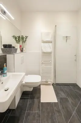 Ein Badezimmer in der Unterkunft glorious cloud apartment