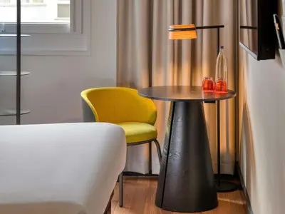 Ein Bett oder Betten in einem Zimmer der Unterkunft ibis Berlin Kurfuerstendamm