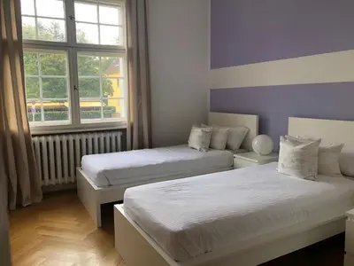 Ein Bett oder Betten in einem Zimmer der Unterkunft Ela Apartments Berlin