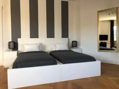 Ein Bett oder Betten in einem Zimmer der Unterkunft Ela Apartments Berlin