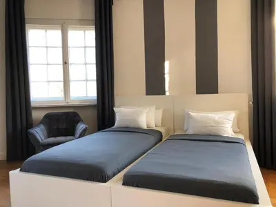 Ein Bett oder Betten in einem Zimmer der Unterkunft Ela Apartments Berlin