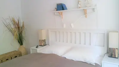 Ein Bett oder Betten in einem Zimmer der Unterkunft HOLI DAY SPA Appartement 1