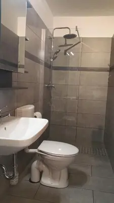 Ein Badezimmer in der Unterkunft HOLI DAY SPA Appartement 1