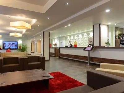 TV/Unterhaltungsangebot in der Unterkunft Motel Plus Berlin