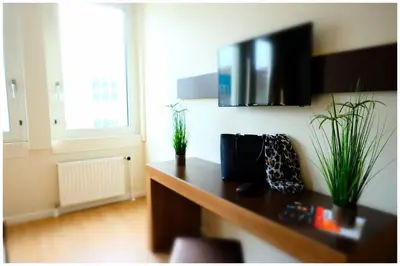 TV/Unterhaltungsangebot in der Unterkunft Motel Plus Berlin