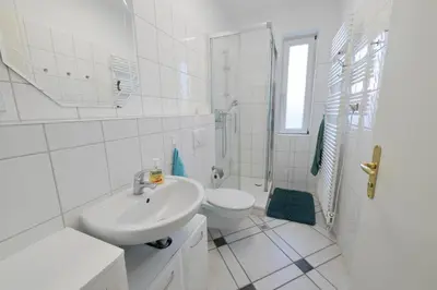 Ein Badezimmer in der Unterkunft Schwalbenflug 1 Berlin