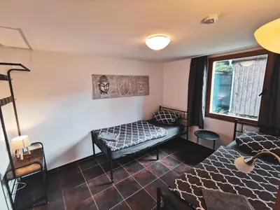 Ein Bett oder Betten in einem Zimmer der Unterkunft Ferienpark am Hellsee