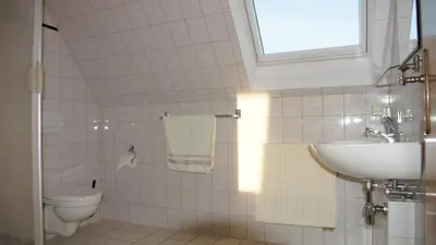 Ein Badezimmer in der Unterkunft Ferienpark am Hellsee