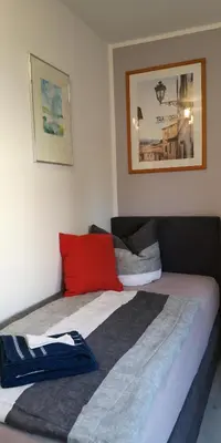 Ein Bett oder Betten in einem Zimmer der Unterkunft Dorfstraße 21 Ferienwohnung 3