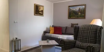 Ein Sitzbereich in der Unterkunft Dorfstraße 21 Ferienwohnung 3