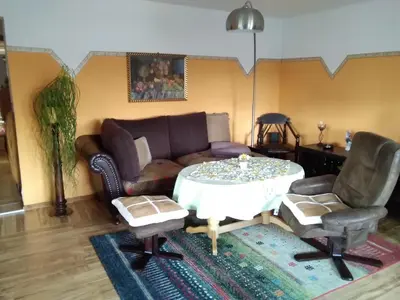Ein Sitzbereich in der Unterkunft Gartenhaus