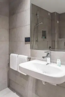 Ein Badezimmer in der Unterkunft Velotel Bad Saarow