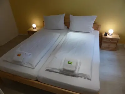 Ein Bett oder Betten in einem Zimmer der Unterkunft LV Rooms & Apartments am Lützowplatz