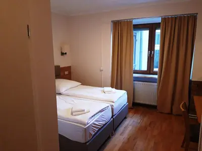 Ein Bett oder Betten in einem Zimmer der Unterkunft LV Rooms & Apartments am Lützowplatz