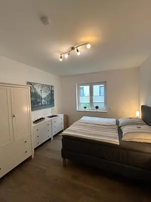 Ein Bett oder Betten in einem Zimmer der Unterkunft TOP-Ferienwohnung bei Berlin, bis 3 Gäste, Terrasse und Garten