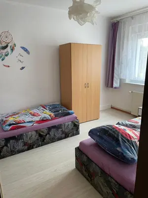 Ein Bett oder Betten in einem Zimmer der Unterkunft Ferienwohnung Sonnenberg Dahmeblick