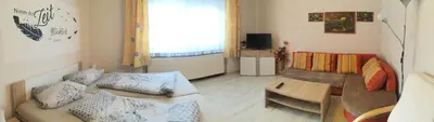 Ein Sitzbereich in der Unterkunft Ferienwohnung Sonnenberg Dahmeblick