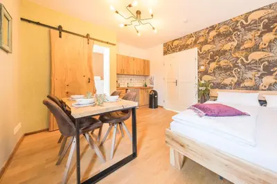 Ein Bett oder Betten in einem Zimmer der Unterkunft Design Apartments - 