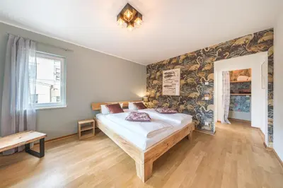 Ein Bett oder Betten in einem Zimmer der Unterkunft Design Apartments - 